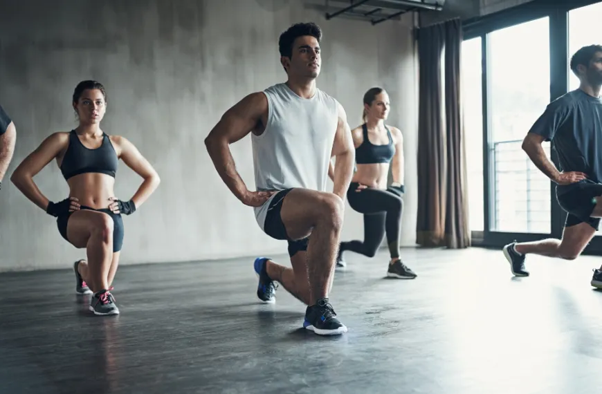 shot of a fitness group having a workout session at the gym